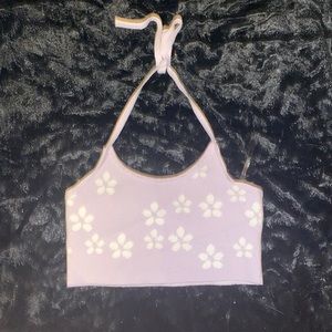 A cute medium purple crop top with white flower print